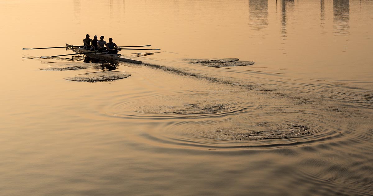 Photo of team rowing